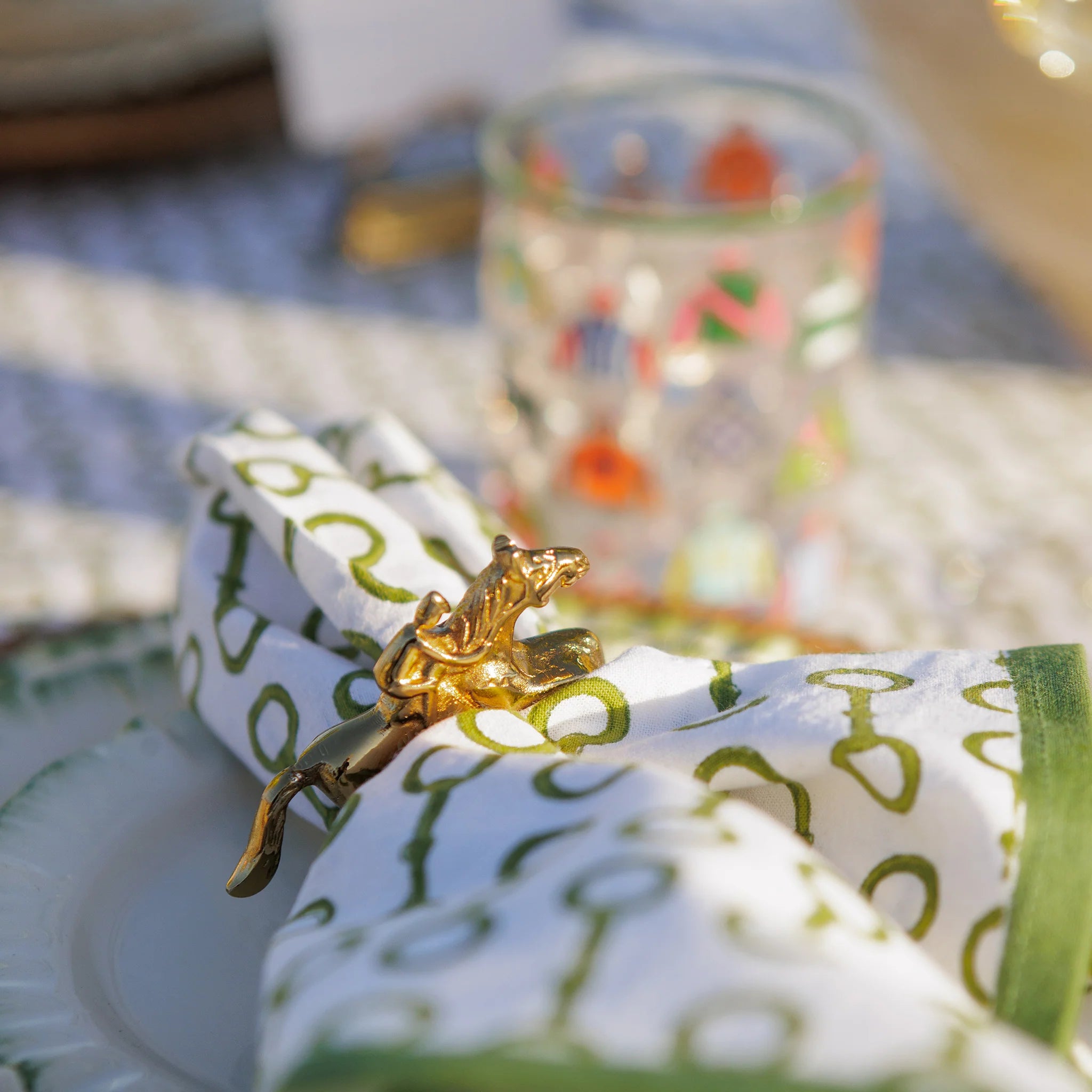 Pomegranate Jockey Napkin Rings in Gold